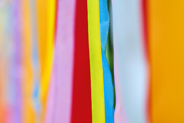 The ribbons serve as a decoration, adding a touch of charm and beauty to the surroundings.