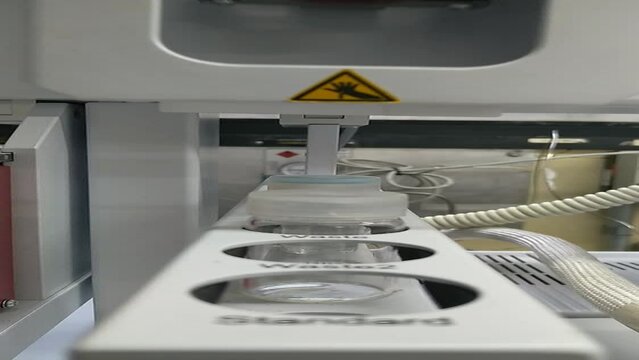 An analytical chemistry autosampler equipment prepares for injecting a sample of water to analyse the organic compounds content in Brazil