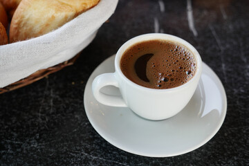 a cup of turkish coffee on table 