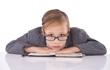 Child, notebook and head on desk, suit and serious as businesswoman on isolated transparent png background. Corporate wear, glasses and entrepreneur as girl, alone and formal for job, work and kid