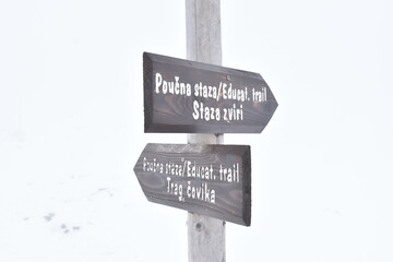 Directional Trail Sign in Winter, Velebit, Croatia.