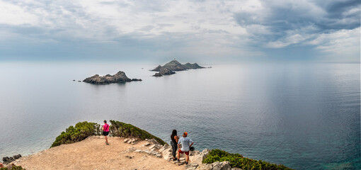 Rocky Coastline. Sanguinaire islands and Parata Tower in Corsica. Near Ajaccio in the Mediterranean Sea, Torra Ghjinuvesa di a Parata, Corsica, France - 672387444