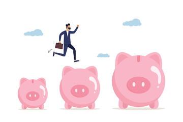 Business man jumping from small piggy bank to bigger profit to achieve financial goal. Increased investment and savings, increased salary or profit, earning more money and accumulating more wealth.