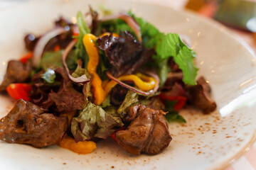Warm salad with liver, food photos
