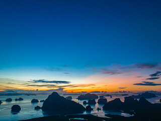 .aerial view Amazing light of nature cloudscape sky above Samed Nang Chee Phang Nga archipelago....