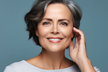 Fototapeta premium Beautiful woman in her fifties for natural beauty and skincare 