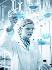 a scientist preparing her experiment, in the style of dark teal and light azure