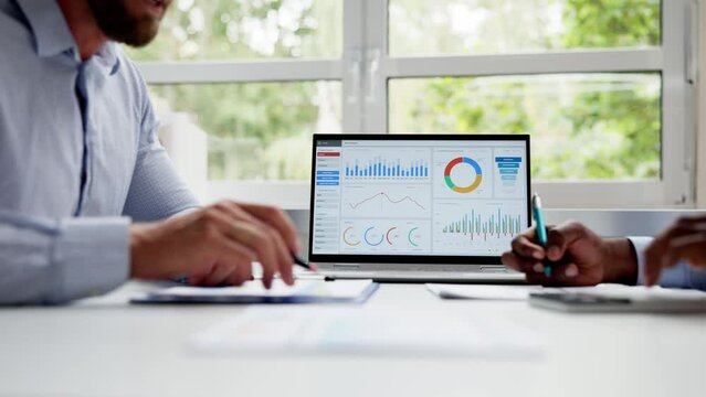 Financial Data Analysts Working In Office