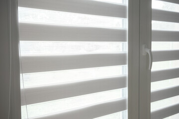 Home interior design - new white window with modern day and night blinds with copy space