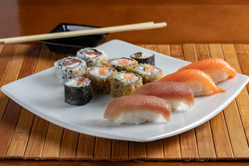 sushi with chopsticks