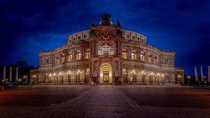 Fototapeta na wymiar Theatreplatz Square illuminated in the blue hour, located in the historic center of Dresden