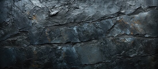 Closeup of a textured background in a rough black metal