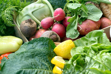 Fresh organic vegetables in a wooden crate, healthy vegetarian food in the diet - 672427278