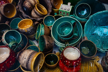 autumn colored handmade dishware background