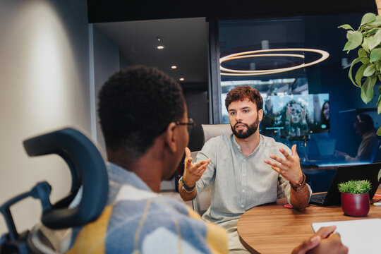 Diverse entrepreneurs collaborate in a co working space, solving problems and achieving profit growth through persistent teamwork. This dynamic workspace fosters creativity, development, and success.