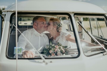 Bride and groom in the car