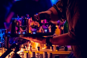 Drink shots on the plate in the nightclub