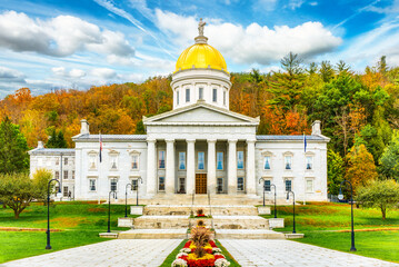 Fototapeta na wymiar Frontal view of Vermont State House, in Montpelier, VT with fall foliage colors. This capitol is a public building and the seat of the Vermont General Assembly.