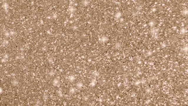 Looping animation of a sparkling golden glitter pattern background