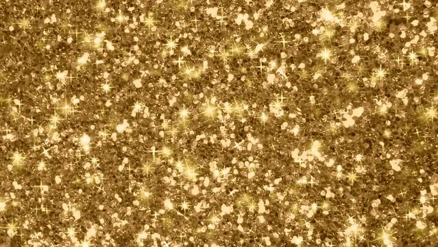 Abstract of Golden glittering background with shiny sparkles and glitter effect