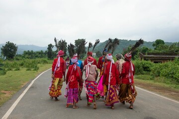 Group of tribal people performing a traditional folk dance in Ajodhya Hills in Purulia, West Bengal