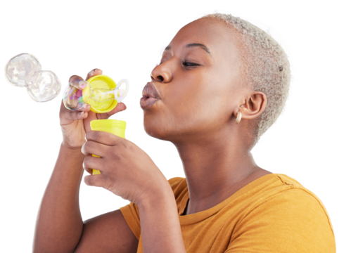 Black woman, wand and playing or blowing bubbles standing isolated on a transparent PNG background. Face of African female person or model with bubble stick for fun soap or playful break in relax