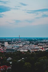 Obraz premium Aerial view of Budapest's vibrant city skyline in the evening, framed by the calm waters
