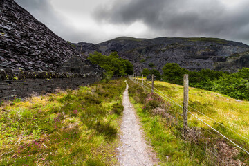 Path in welsh slate quarry, Snowdonia or Eryri National Park. - 672457255