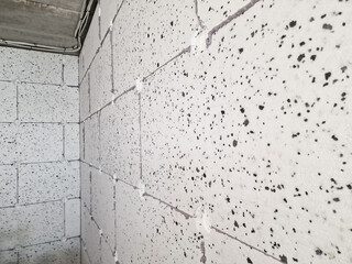 Glueing polystyrene boards for passive house at the progress