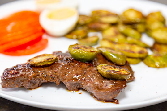 The most traditional grilled beef liver with jil&oacute;. Brazilian rustic food