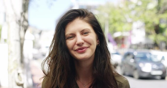 Face, woman and interview in city, opinion of politics and critic dislike government. Portrait, happy student answer question in street and talk on tv, news broadcast and communication in Ukraine