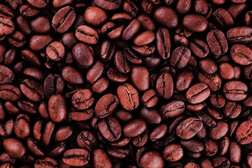 Freshly baked  dried coffee beans on background - obrazy, fototapety, plakaty