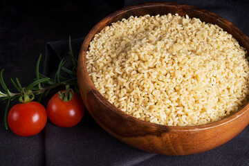 Dry pasta closeup uncooked on background