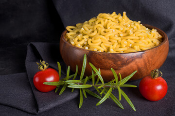 Dry pasta closeup uncooked on background