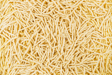 Dry pasta closeup uncooked on background