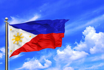 Philippines National Flag Waving In The Wind On A Beautiful Summer Blue Sky