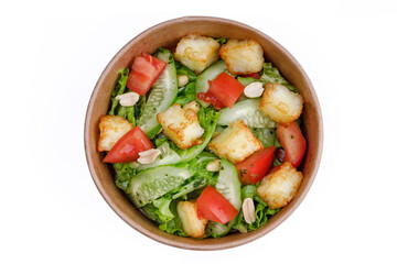 Salad with cheese, cucumber and tomatoes on a white background, for a food delivery site 2