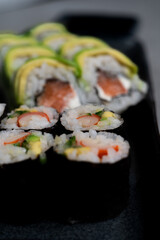 Crab and salmon Maki Rolls. Close-Up on sushi. selective focus