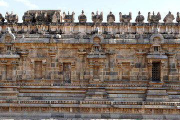 Temple wall with relief carvings. Stone wall of ancient Indian temple of Airavatesvara Temple, Darasuram, Kumbakonam, Tamilnadu. - obrazy, fototapety, plakaty