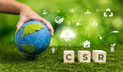 Businessman's hand holding Earth globe symbolize corporate commitment to CSR practice to reduce...