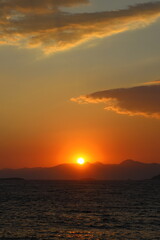 sunset on the beach. Seaside town of Turgutreis and spectacular sunsets. Selective Focus.