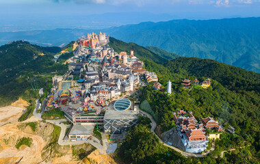 Aerial view of  Ba Na Hills, with beautiful castles, buildings, streets and campuses at the famous...