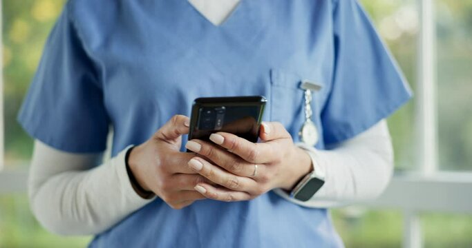 Hands, phone and a nurse closeup in the hospital typing a text message for communication or networking. Healthcare, medical and social media with a medicine professional in the hospital or clinic