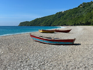 Three boats on the beach in the island