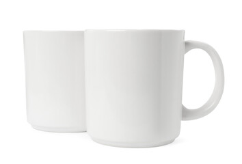 Two light ceramic mugs isolated on white