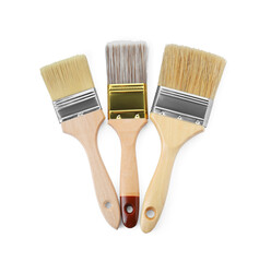 Wooden paint brushes isolated on white, top view