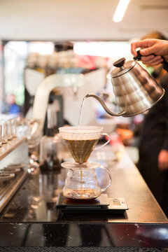 Making pour over coffee.