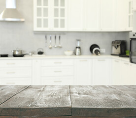 Empty wooden table in kitchen, space for design