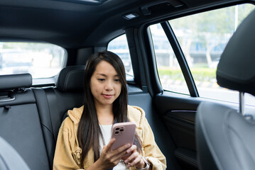 Woman use of mobile phone in car