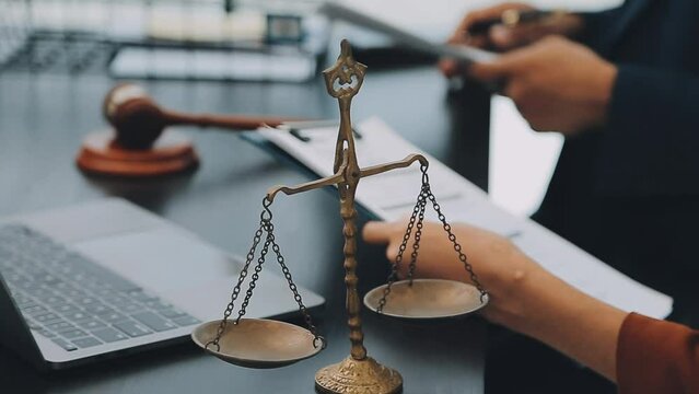 Judge gavel with Justice lawyers, Businessman in suit or lawyer working on a documents. Legal law, advice and justice concept.